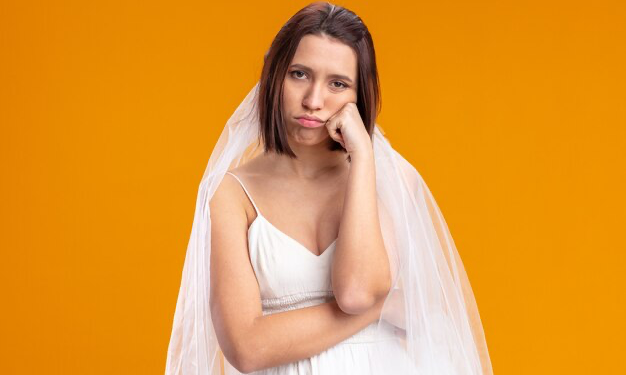 Sad bride in a wedding dress