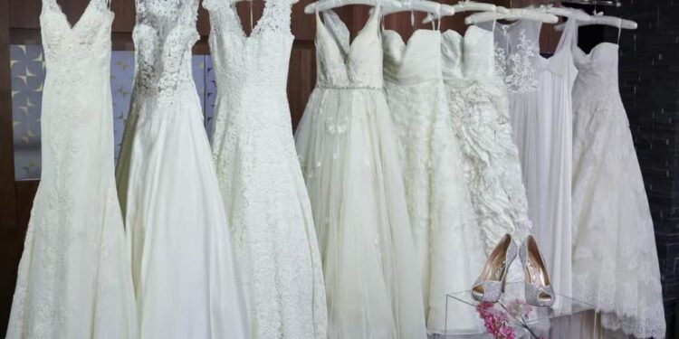 Wedding dresses hanging on the rack